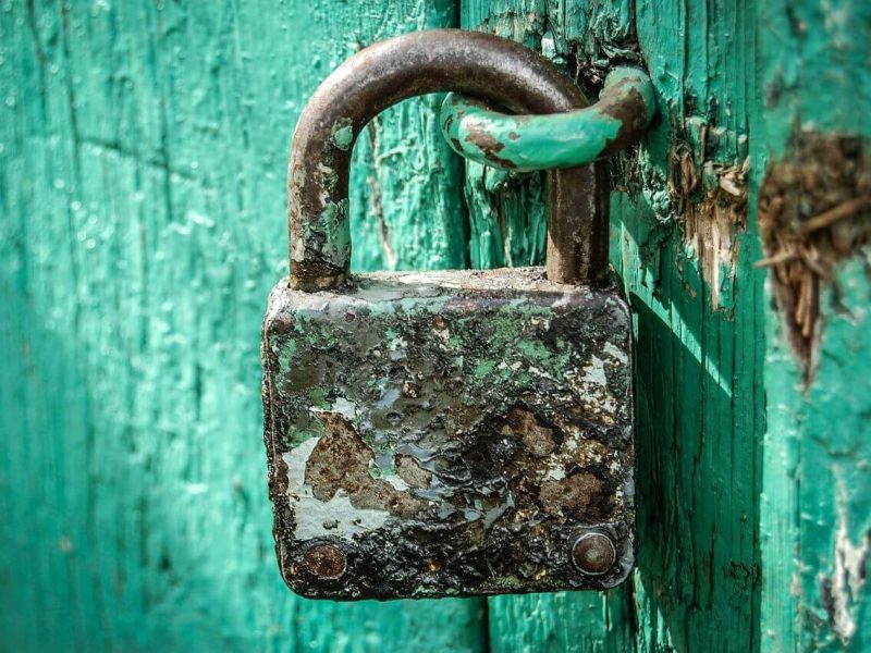 Rusty Padlock On Blue Door Rusty Padlock On Blue Door ALT